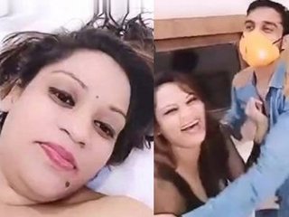 Desi couple's threesome in hotel room with sex toys