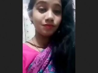 Young girl and her girlfriend share their love in a steamy video