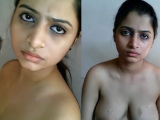 Watch a cute girl in nude clips with a Desi camera
