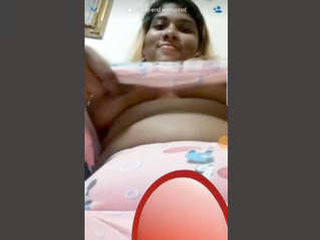 MILF babe flaunts her big boobs in a seductive video call