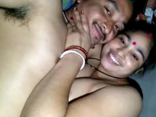 Two happy Indian couples enjoy each other's company