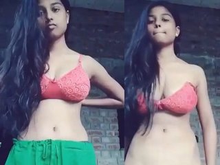 Cute young girl gets naughty in front of the camera