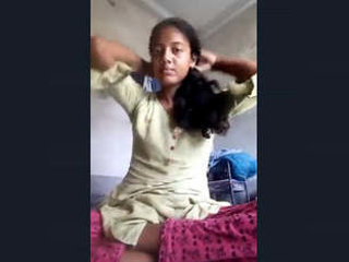 Watch a sexy Indian girl flaunt her breasts in a steamy video