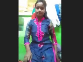 Sexy Desi teen opens her dress and shows off her perky boobs