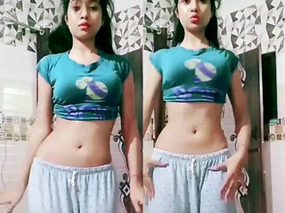 Desi babe teases with her body and pleasures herself in sea dance