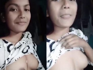 Young college girl flaunts her small breasts