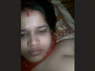 Horny bhabhi fondles her breasts and caresses them with her hands