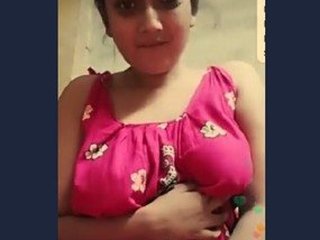 Indian wife flaunts her small nipples in seductive video