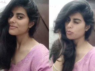 A young and cute Indian girl goes nude in a solo video