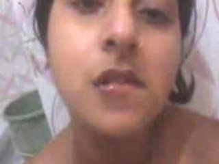 Busty Indian girl plays with her big boobs in a solo video