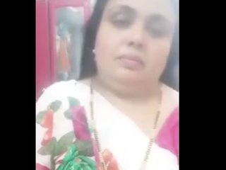 Sexy mature bhabhi gets off in front of the camera